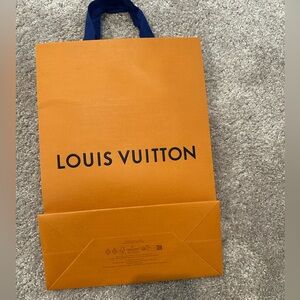 Louis Vuitton Bold Orange Bag with Blue Handles